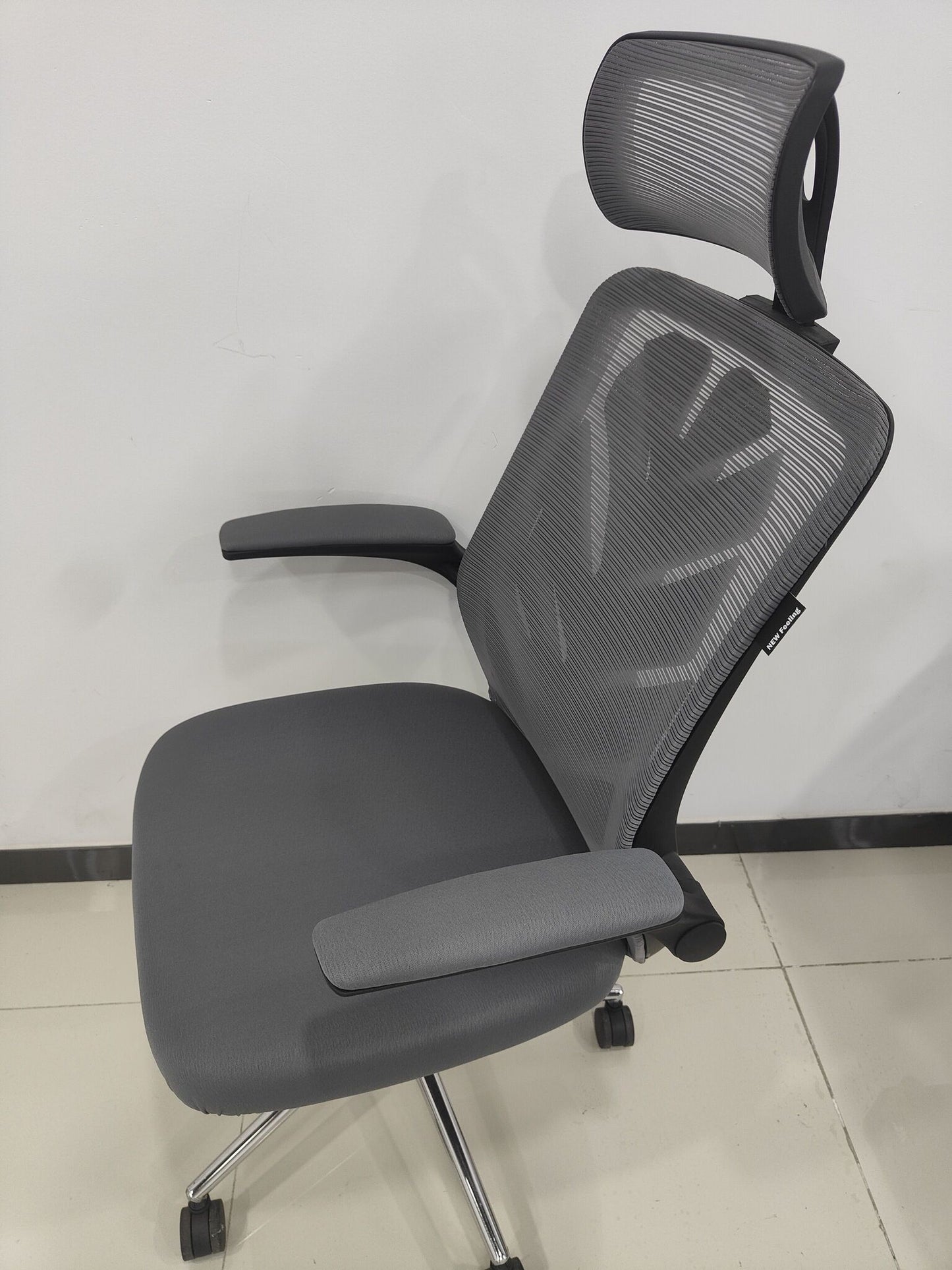 NEW Feeling Ergonomic office chair with high back and headrest